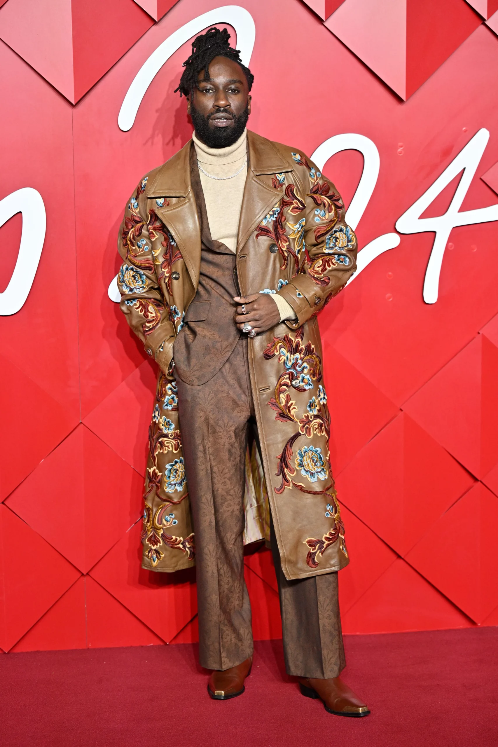 Kojey Radical in Etro, and a vintage Rolex sourced by Kettle Kids.