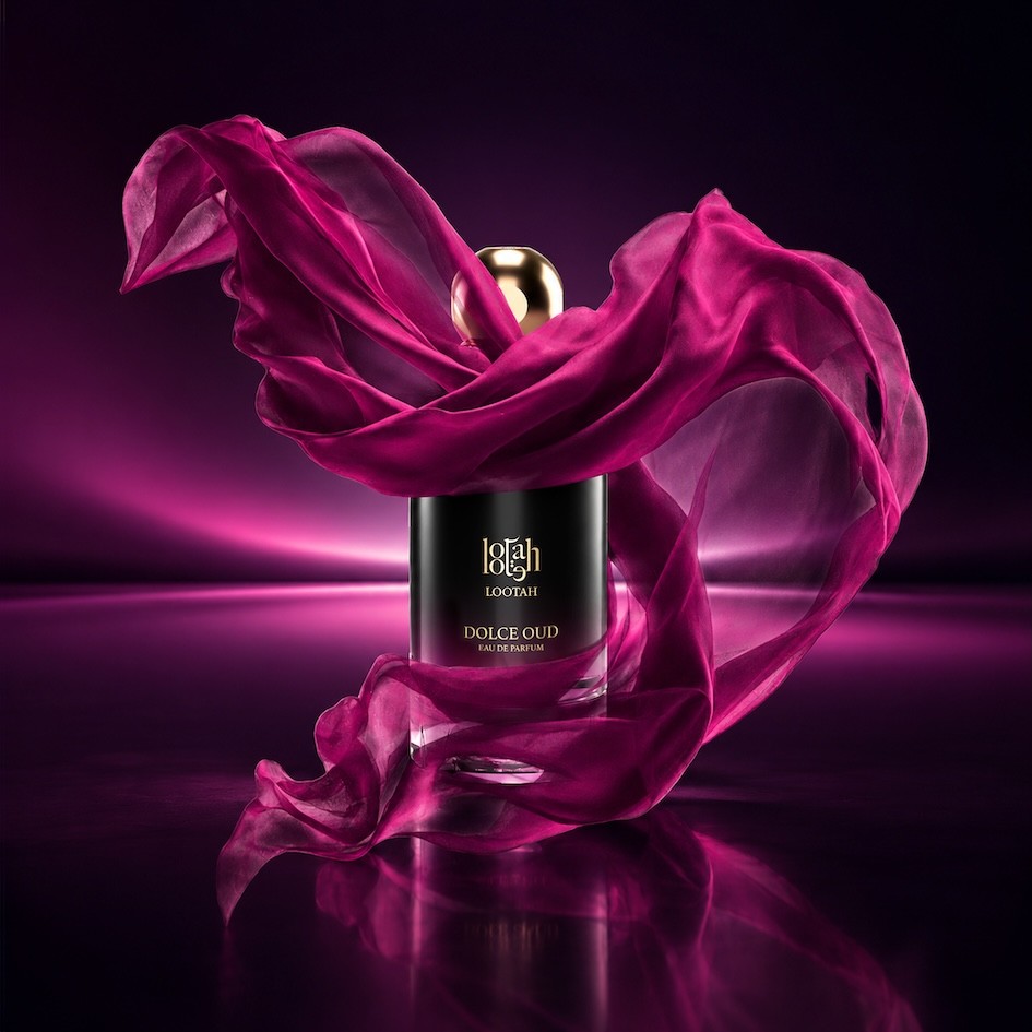 The LOOTAH Dolce Oud bottle wrapped in magenta silk