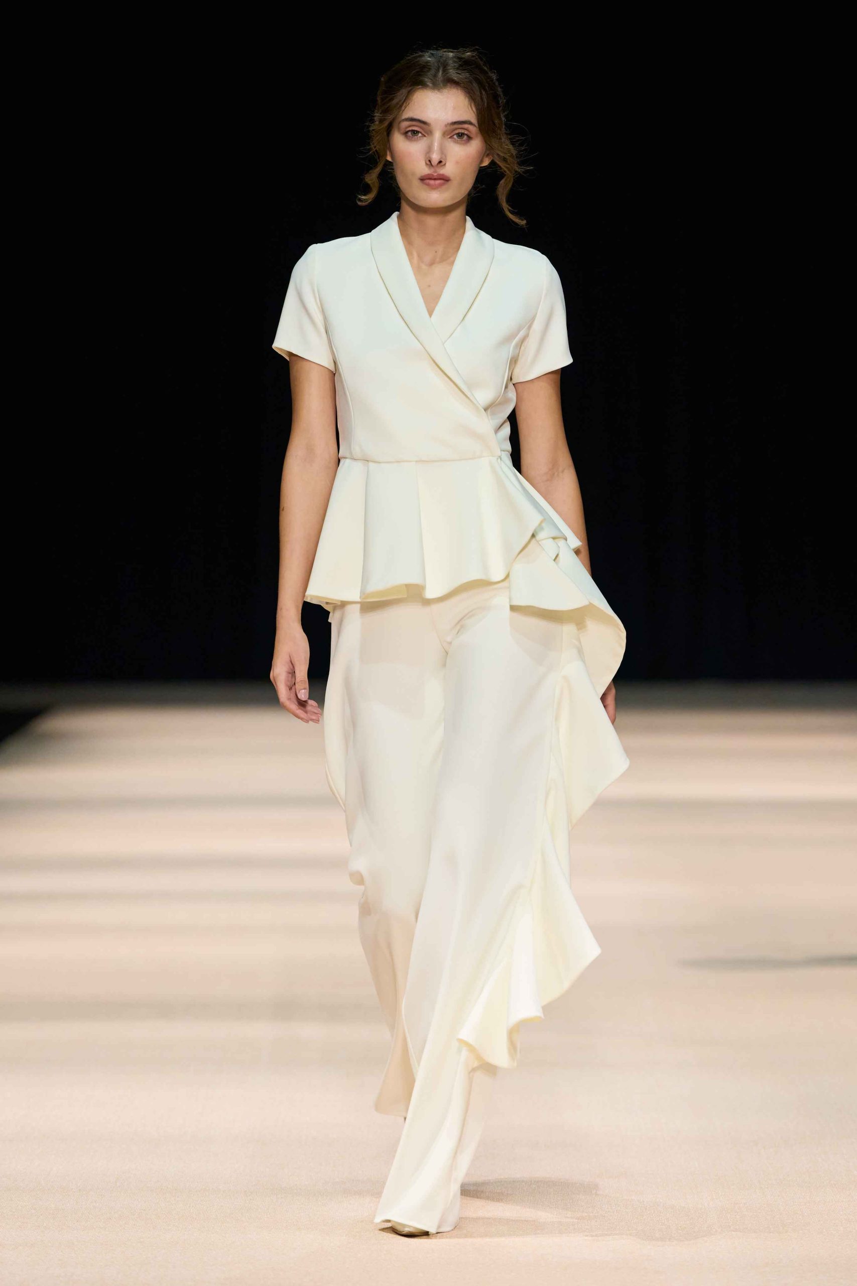 Adriana Capasso SS27 TRACE collection runway look at Dubai Fashion Week